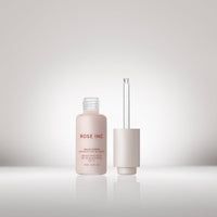 Image of Travel Size Rose Inc Solar Power Luminous SPF 30 Serum open with dropper beside it