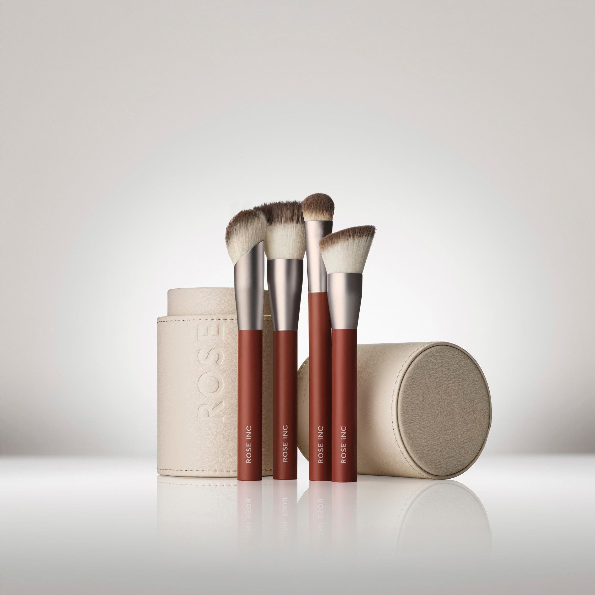 The Complexion Brush gift featuring 4 brushes and a Signature Makeup brush case.