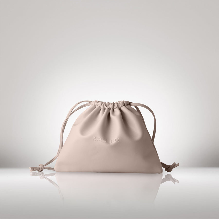 Rose Inc Signature Vegan Leather Drawstring Bag in Rose Smoke color