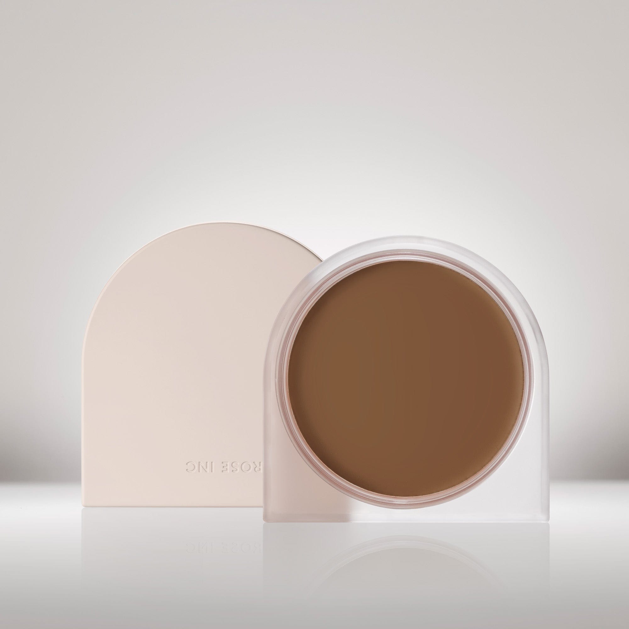 Open jar of Solar Infusion Soft-Focus Cream Bronzer in shade Seychelles