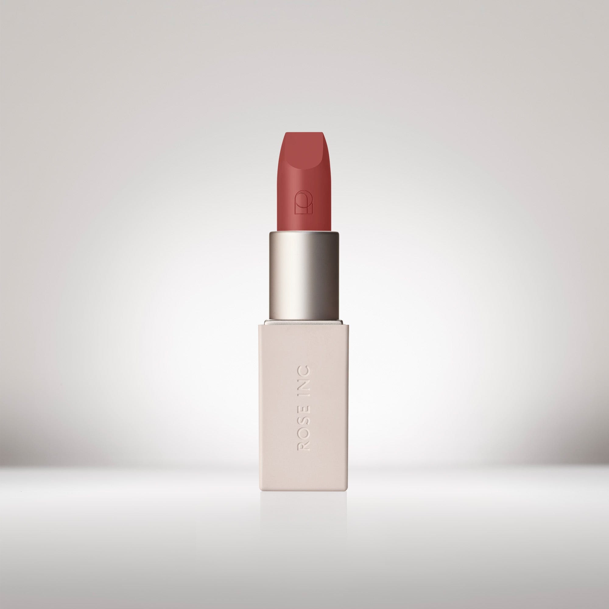 Image of an opened Satin Lip Color Rich Refillable Lipstick in shade Enigmatic