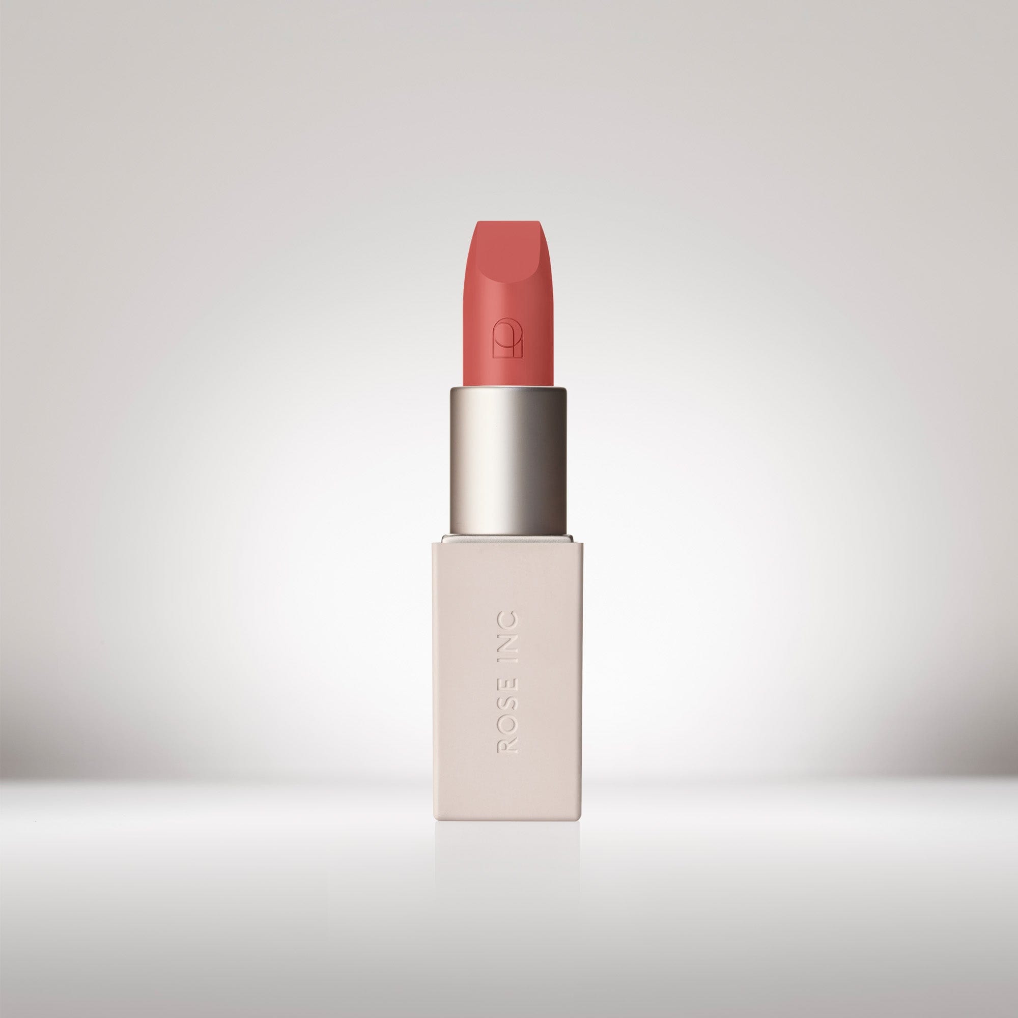 Image of an opened Satin Lip Color Rich Refillable Lipstick in shade Poetic