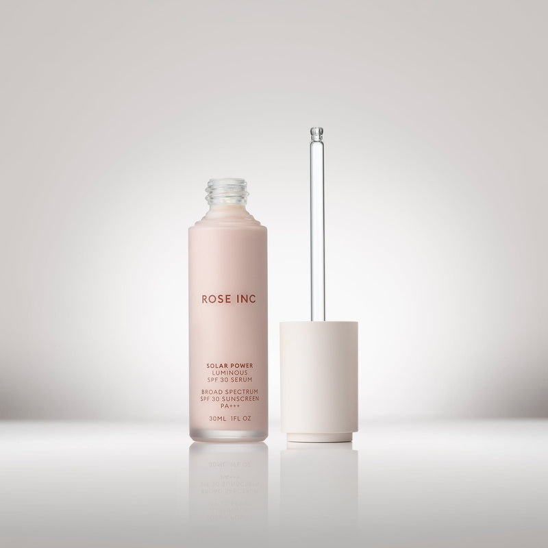 Image of the Solar Power Luminous SPF 30 Serum opened with dropper beside it.